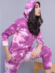 Cloudy Purple watercolour tie dye hoodie set styled in a raised-leg pose showing the coordinated hoodie and trousers