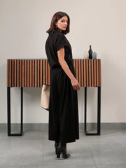 Full-length side view of the Jax Black summer matching set with a relaxed button-down shirt and wide-leg trousers.