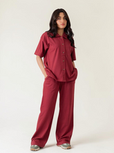 Larissa Berry button-down co ord set for women featuring a collared short-sleeve shirt and matching wide-leg trousers.