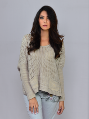 Front standing view of Coastline's Sienna Chunky Sweater in Sand, styled with light blue jeans.