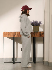 Side and back view of the Soho Heather Grey matching set showing the hood resting on the back and matching trousers.