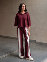 Zane Mulberry women's co-ord set with a relaxed collared top and wide-leg trousers with contrast stripes