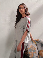Closer view of the Zoey Heather Grey top highlighting its contrasting ribbed neckline and decorative sleeve tape.