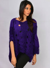 Standing angled view of Coastline's Purple Indigo Oversize Audrey Sweater, featuring a relaxed silhouette and textured knit design.
