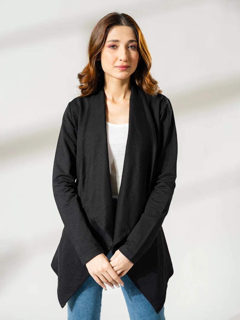 Front view of the black Ash Front Open Overlayer with a slim fit, worn with a white top and blue jeans.