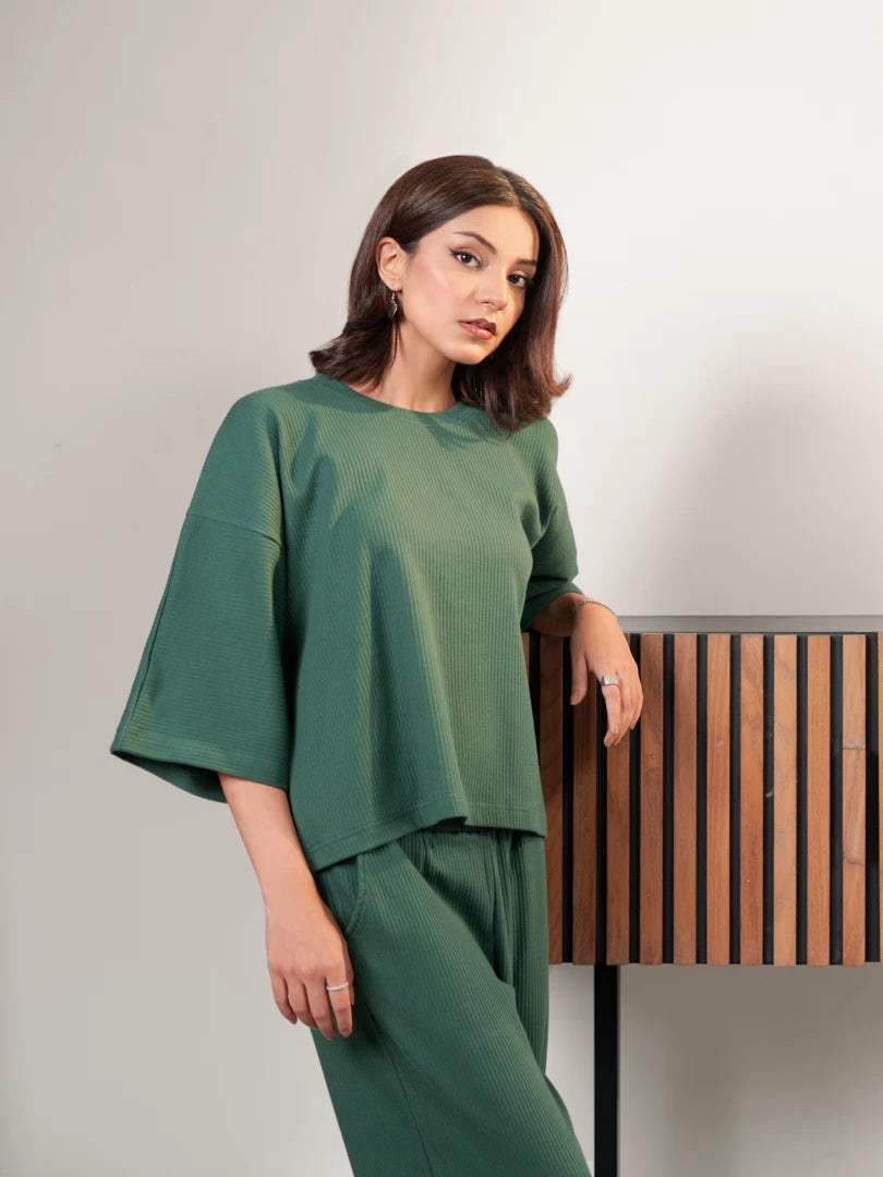 Model wearing The Blair Evergreen co ord set, showing the relaxed top and coordinated wide-leg trouser silhouette