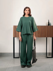 Front view of The Blair Evergreen women's two-piece set featuring a relaxed top and flowing wide-leg trousers