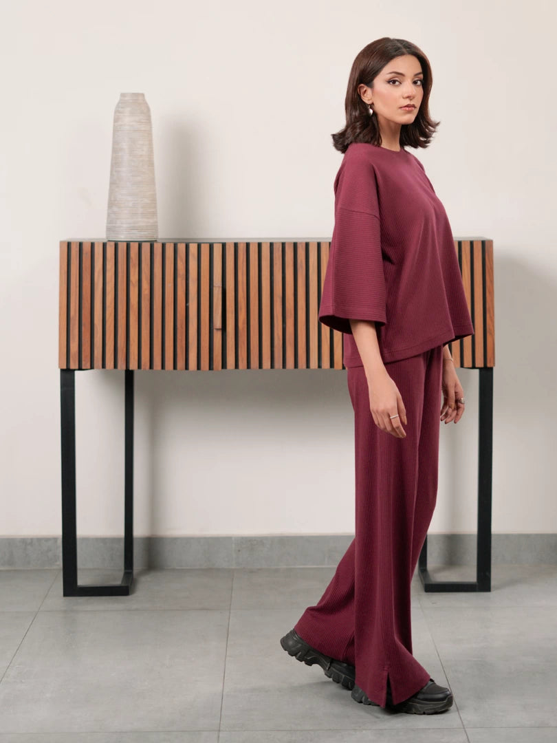The Blair Plum women's co ord set featuring a relaxed double-knit top and matching wide-leg trousers