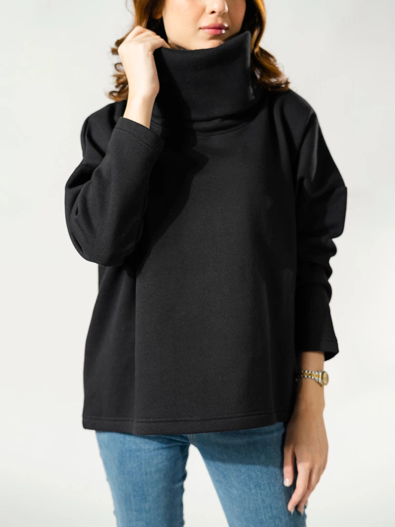 Close-up of the Elkin black sweatshirt showing its oversized folded high-neck collar and soft fleece fabric.