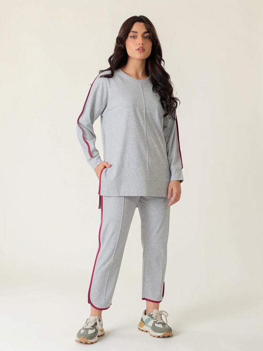 Front view of the Ivy Heather Grey summer athleisure set showing the long top and matching trousers with contrasting binding.
