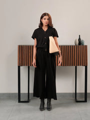 Front view of the Jax Black two-piece co-ord set showing the collared shirt and high-waisted wide-leg trousers.