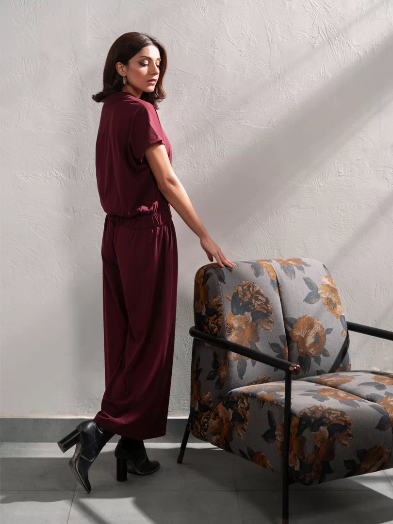 Side view of the Jax Mulberry co-ord set showing the collared top and wide-leg trouser silhouette