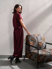 Side view of the Jax Mulberry co-ord set showing the collared top and wide-leg trouser silhouette