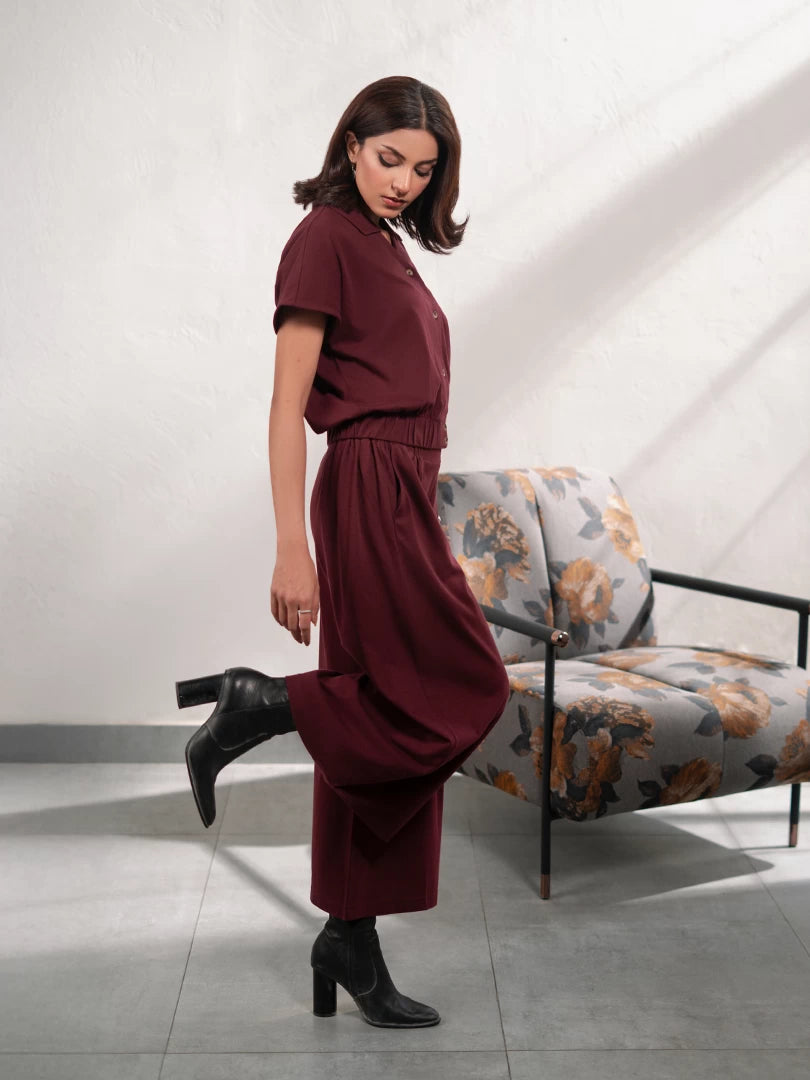 Full-length view of Jax Mulberry matching set featuring a button-down top and flowing wide-leg trousers