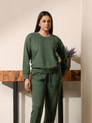 Front view of the Kiwi green matching sweat set showing the crew-neck sweatshirt and garment-dyed finish.