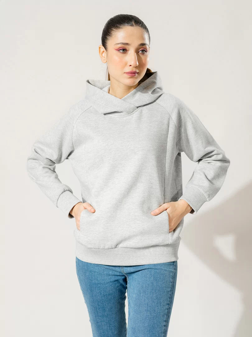 Front view of the Naia fleece pullover hoodie in Heather Grey, showing its overlapping hood and front pockets.