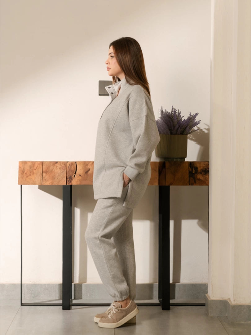 Side view of Nina Heather Grey matching set showing the long length sweatshirt and relaxed trouser fit
