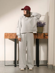 Full-length front view of the Soho Heather Grey winter hoodie set showing the relaxed boxy top and wide-leg trousers.