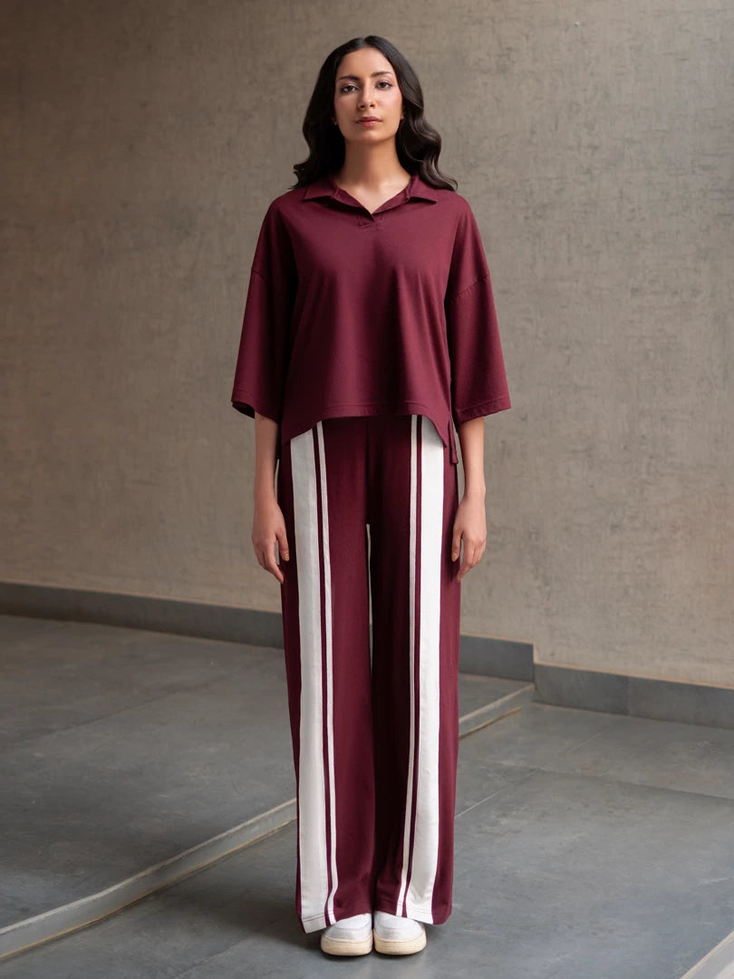Full-length front view of Zane Mulberry matching set with a loose-fit top and striped wide-leg trousers